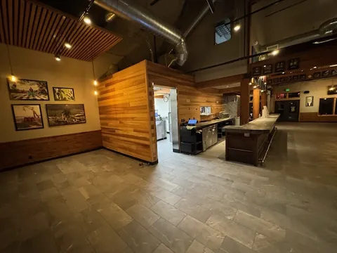 Cedar slat wall and timber framing inside the taproom