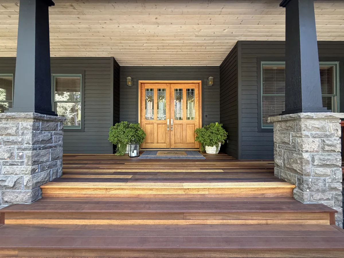 Rebuilt front steps and timber canopy at the Broken Top Exterior project