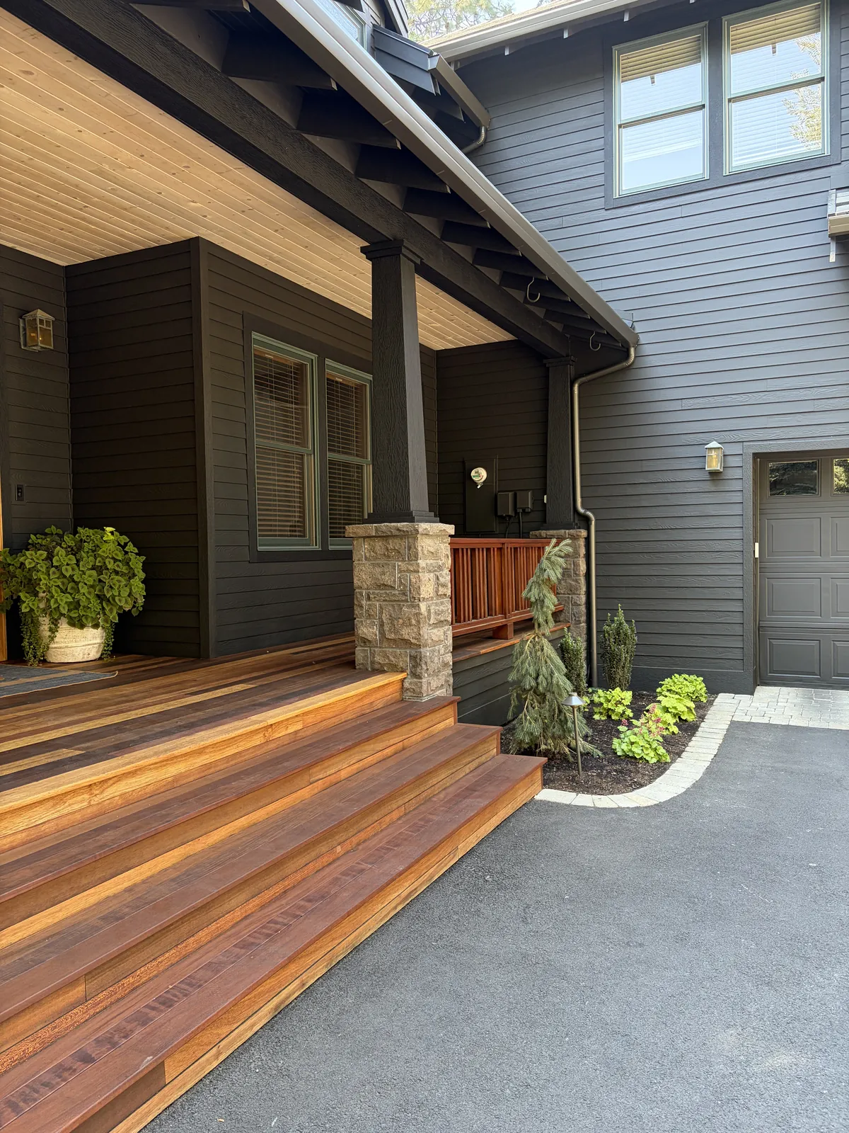 Rebuilt front steps and timber canopy at the Broken Top Exterior project