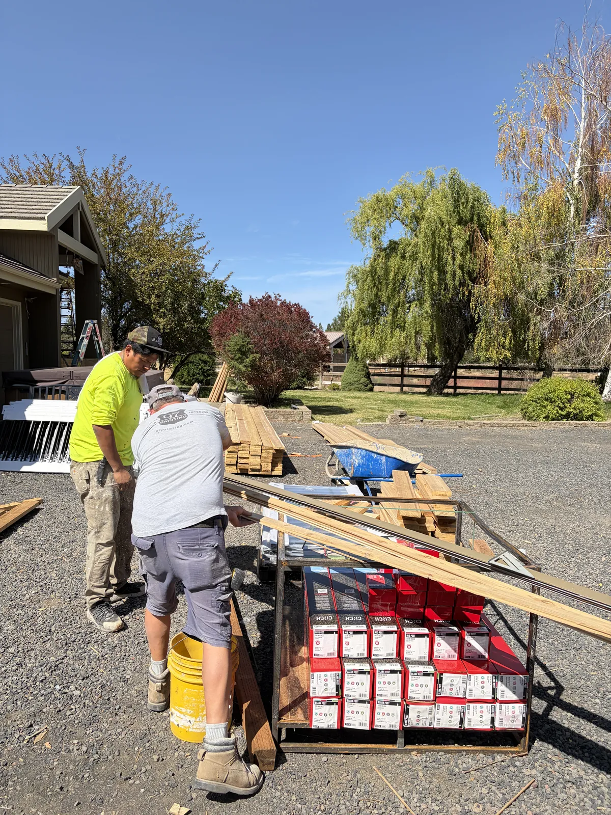 97 Builders crew carrying lumber on a Central Oregon job site