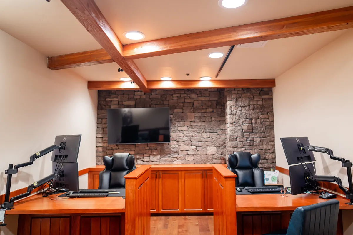 Lodge office desks and stone accent wall after the refresh