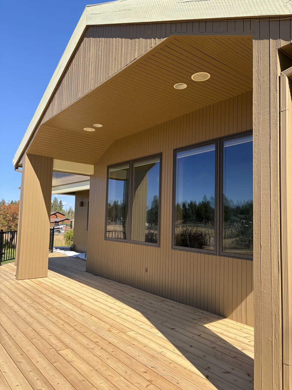 Covered back porch and deck after the siding work